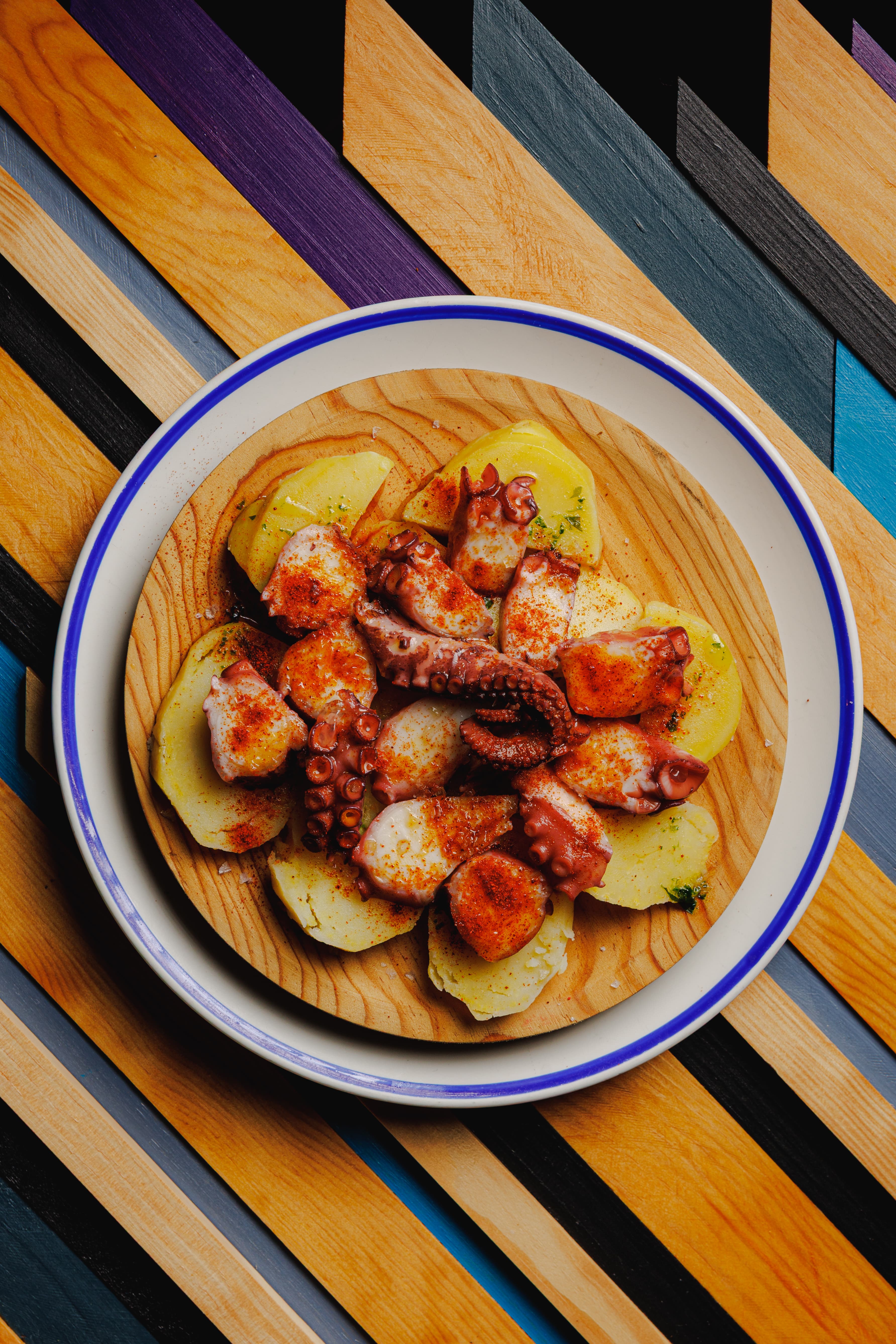 Pulpo con patata y piperrada